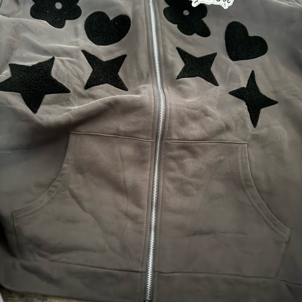 Stylish Jacket with Black Star and Heart Accents - Picture 2 of 6